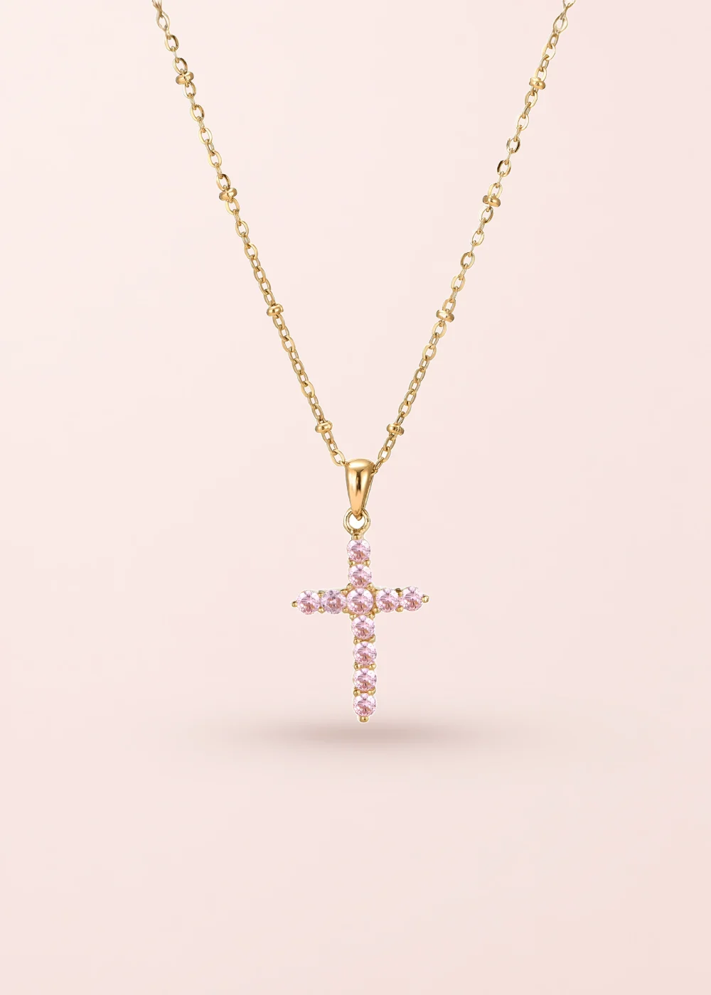 Produktfoto: Grace Pink – Kreuz-Halskette mit rosa Details in Goldoptik
