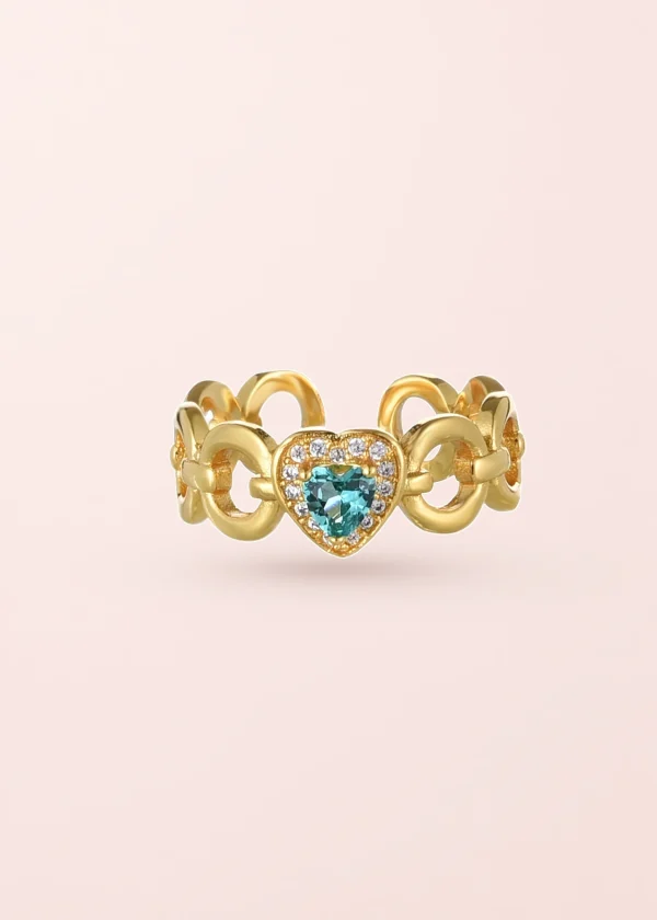 Sacre Blue Heart – Ring mit Herzmotiv und blauen Details in Goldoptik