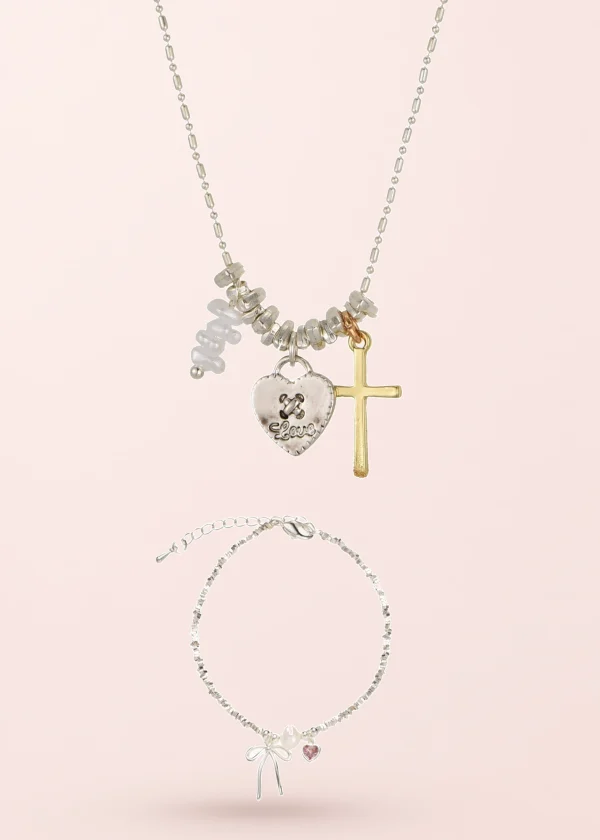Mary & Mina – Schmuckset mit Schleife, Kreuz und Herzen in Silberoptik
