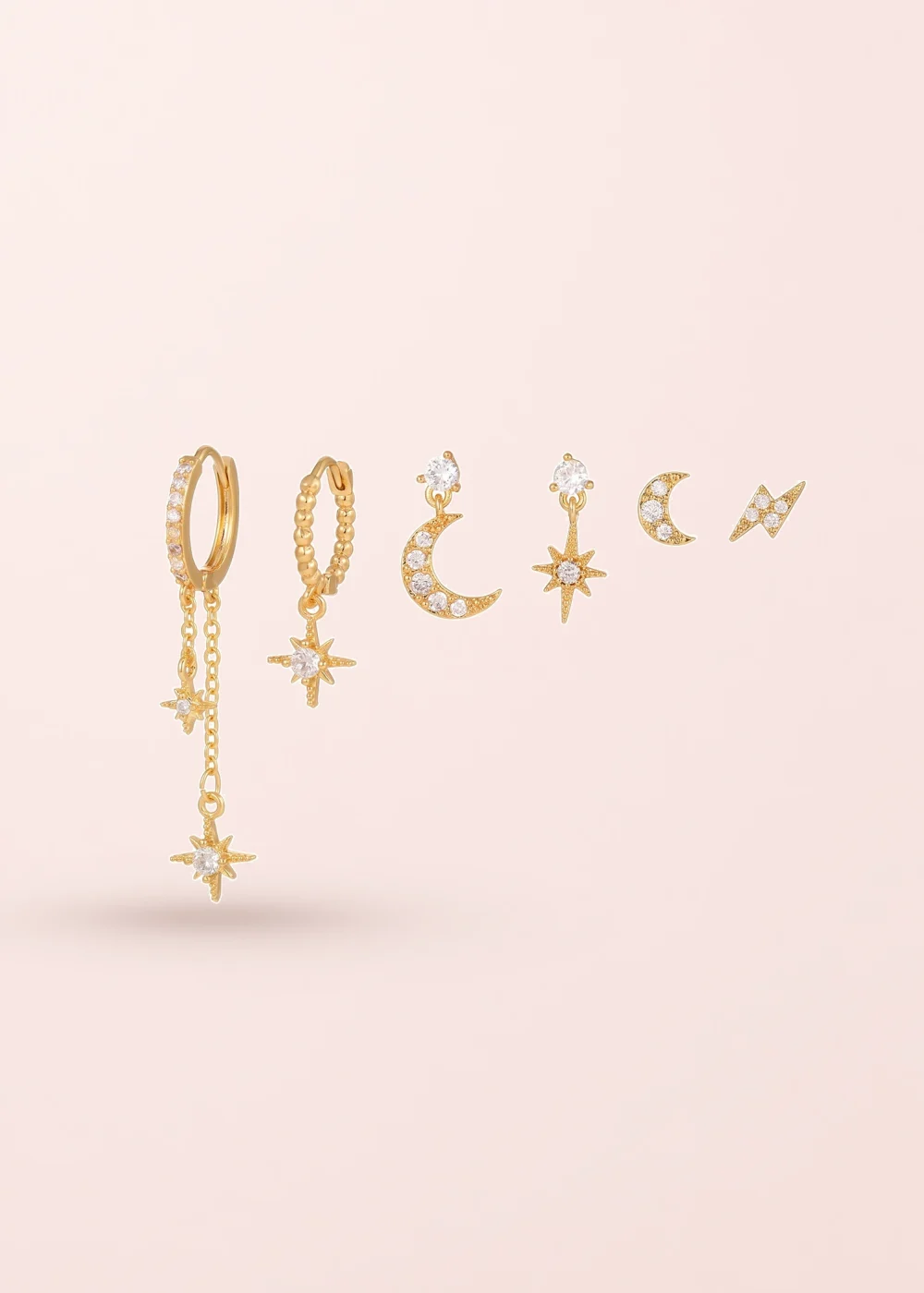 Petit Cosmos Earrings Set on a pink background